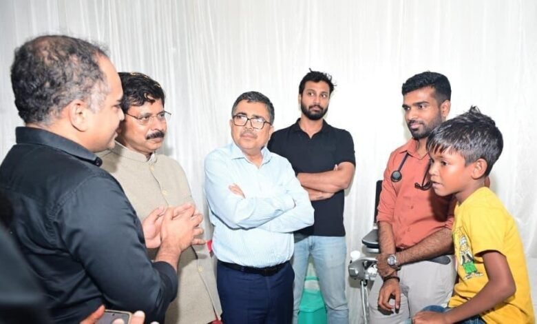Doctors examining children during Gift of Life heart screening camp in Bokaro